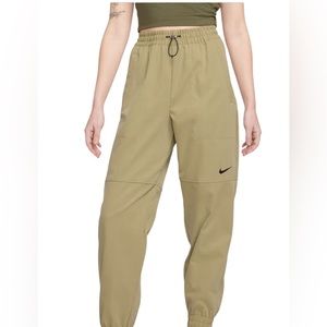 Nike Sportswear Water Repellent Swoosh Pants in Neutral Olive/Black Size: La